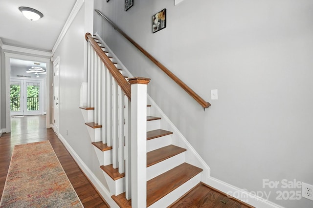 5807 Mctaggart Ln, Charlotte, NC 28269 - stairway featuring wood finished floors and crown molding