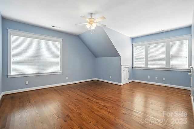 5807 Mctaggart Ln, Charlotte, NC 28269 - bonus room with a ceiling fan, wood finished floors, and vaulted ceiling