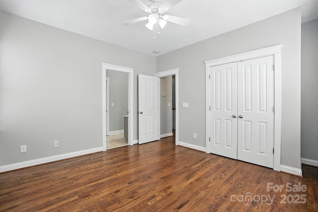5807 Mctaggart Ln, Charlotte, NC 28269 - unfurnished bedroom with wood finished floors, a closet, and ceiling fan