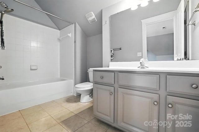5807 Mctaggart Ln, Charlotte, NC 28269 - full bathroom with tile patterned flooring, lofted ceiling, vanity, and  shower combination