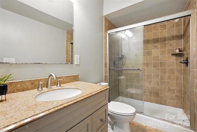 5807 Mctaggart Ln, Charlotte, NC 28269 - full bathroom featuring vanity, a shower stall, and tile patterned floors