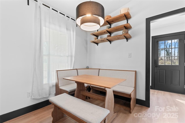 5501 Joyce Dr, Charlotte, NC 28215 - dining space featuring light wood finished floors and baseboards