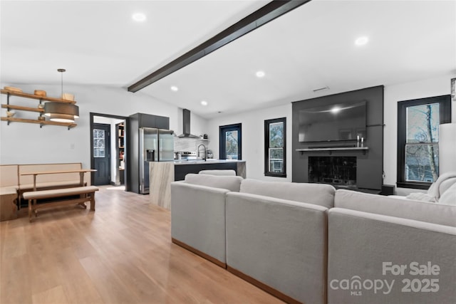 5501 Joyce Dr, Charlotte, NC 28215 - living area with recessed lighting and light wood-style floors