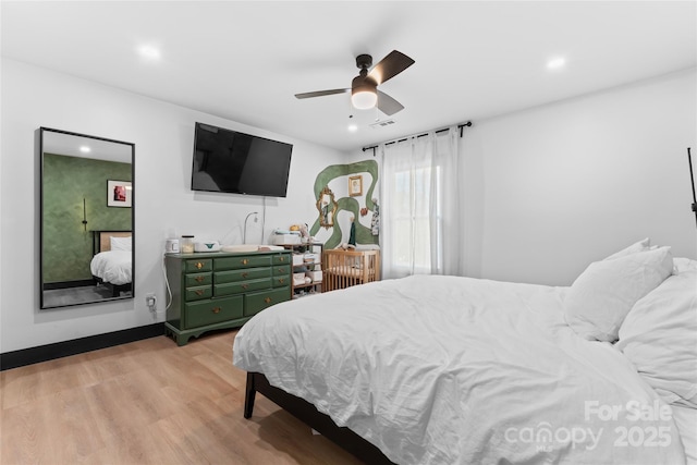 5501 Joyce Dr, Charlotte, NC 28215 - bedroom with light wood finished floors, recessed lighting, and ceiling fan