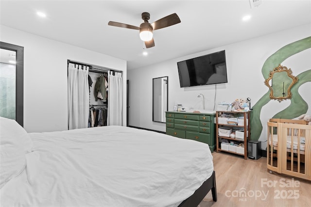 5501 Joyce Dr, Charlotte, NC 28215 - bedroom featuring light wood-type flooring, ceiling fan, recessed lighting, and a closet