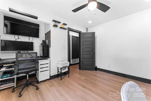 5501 Joyce Dr, Charlotte, NC 28215 - office space featuring wood finished floors, a ceiling fan, and baseboards