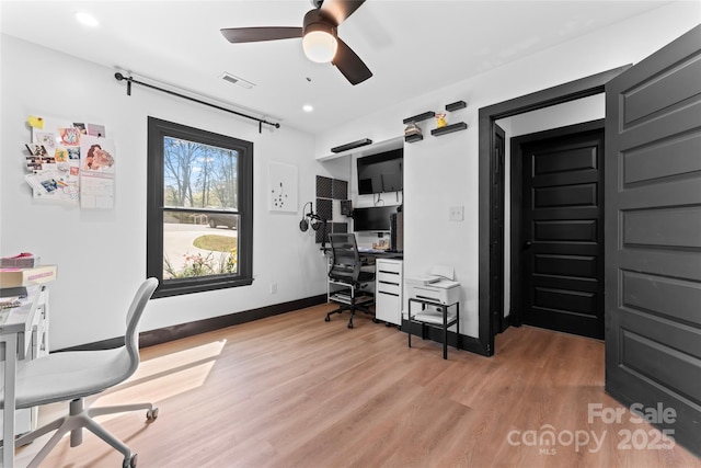 5501 Joyce Dr, Charlotte, NC 28215 - office with light wood-style floors, a ceiling fan, recessed lighting, and baseboards