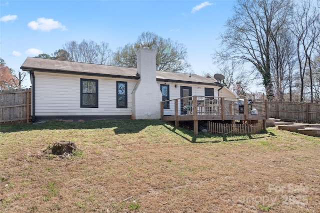 5501 Joyce Dr, Charlotte, NC 28215 - rear view of property featuring a wooden deck and a chimney