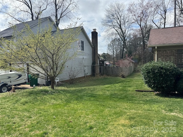 view of yard with fence