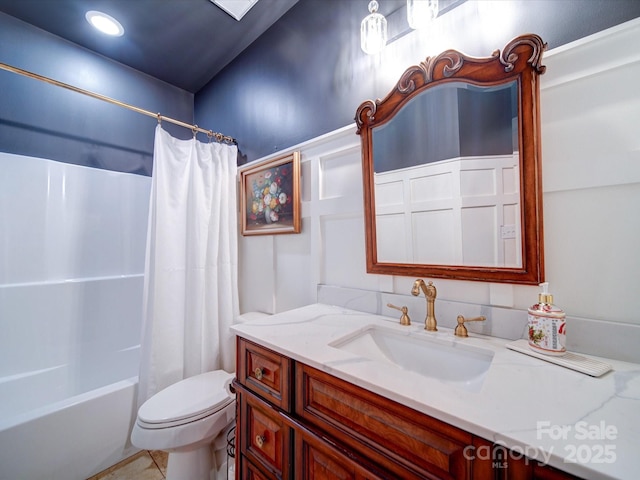 full bathroom with toilet, shower / bath combo with shower curtain, and vanity