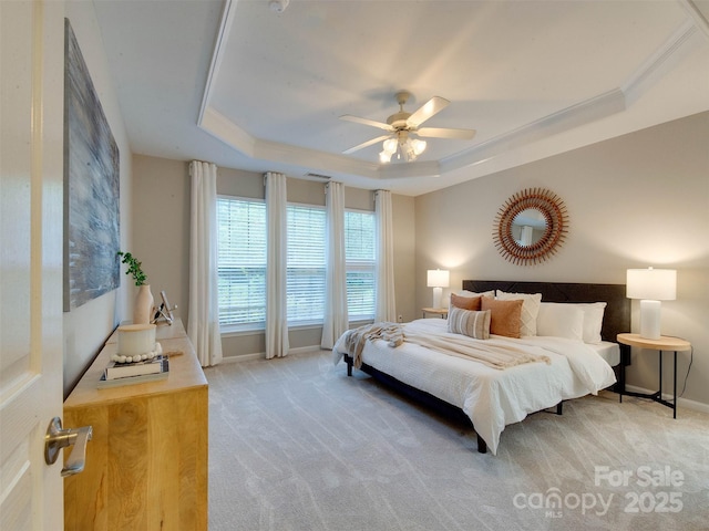 9607 Kestral Ridge Dr, Charlotte, NC 28269 - bedroom with a tray ceiling, light colored carpet, and baseboards