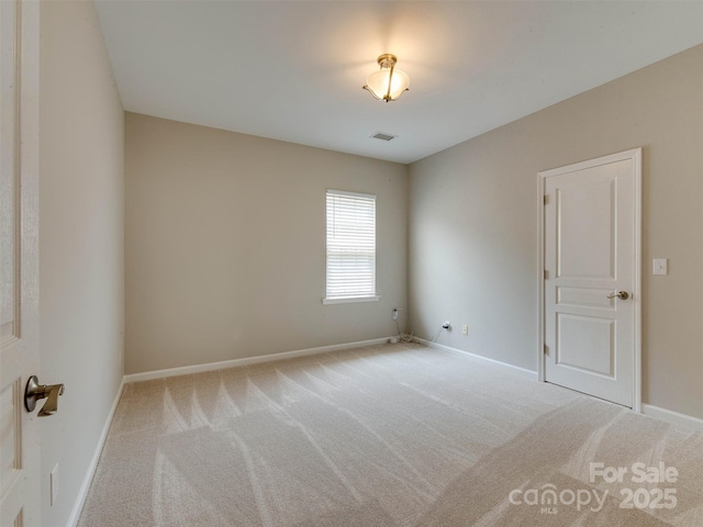 9607 Kestral Ridge Dr, Charlotte, NC 28269 - empty room featuring carpet and baseboards