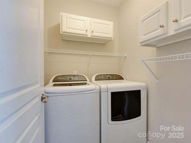 9607 Kestral Ridge Dr, Charlotte, NC 28269 - laundry room featuring washing machine and clothes dryer and cabinet space