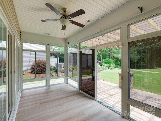 9607 Kestral Ridge Dr, Charlotte, NC 28269 - unfurnished sunroom with a ceiling fan