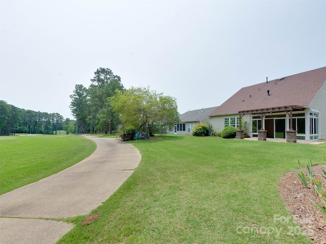 9607 Kestral Ridge Dr, Charlotte, NC 28269 - view of green lawn featuring a pergola