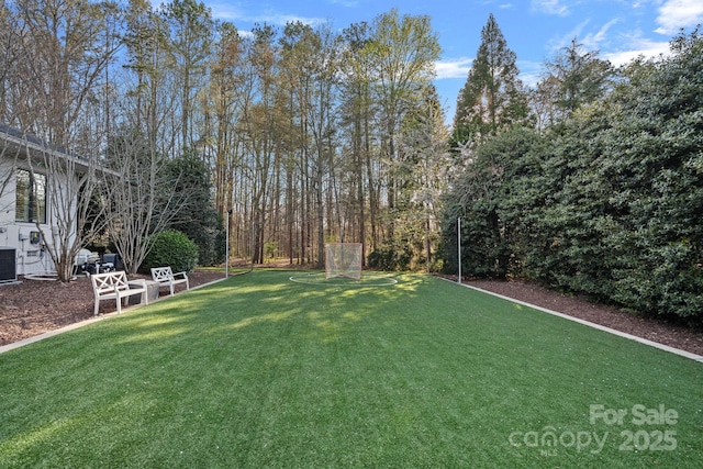 19117 Davidson Concord Rd, Davidson, NC 28036 - view of grassy yard featuring central AC