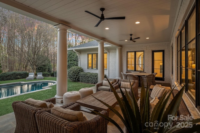 19117 Davidson Concord Rd, Davidson, NC 28036 - view of patio featuring ceiling fan, an outdoor pool, and outdoor dining space