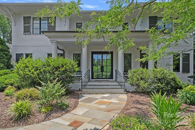 19117 Davidson Concord Rd, Davidson, NC 28036 - view of front facade with stucco siding and covered porch