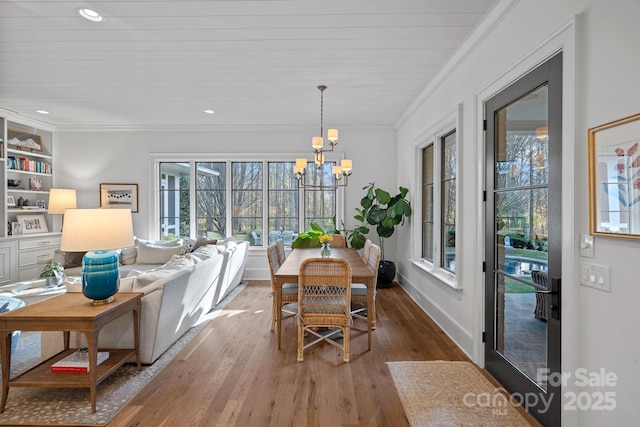19117 Davidson Concord Rd, Davidson, NC 28036 - dining room with a chandelier, ornamental molding, wood finished floors, baseboards, and recessed lighting