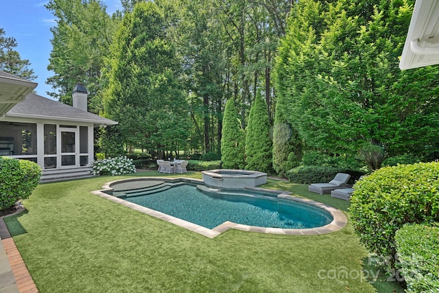 19117 Davidson Concord Rd, Davidson, NC 28036 - view of pool featuring a lawn, a sunroom, and a pool with connected hot tub