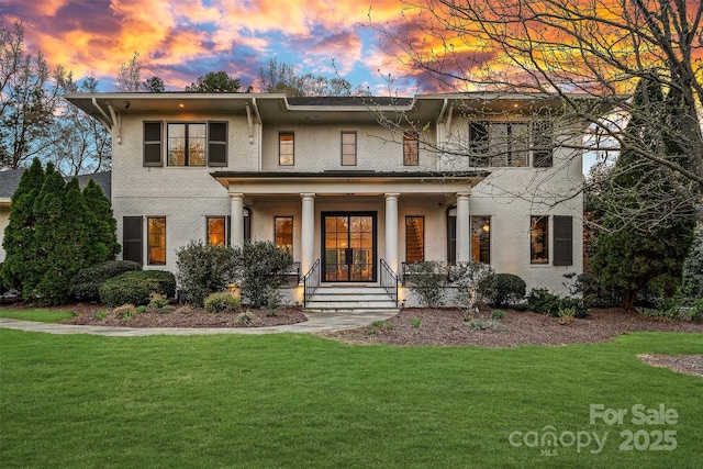 19117 Davidson Concord Rd, Davidson, NC 28036 - view of front of property featuring covered porch and a front yard