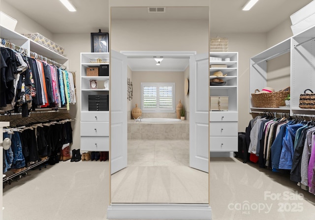 21311 Baltic Dr, Cornelius, NC 28031 - walk in closet featuring visible vents