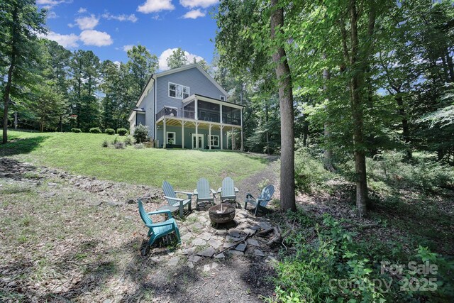 463 Lake Wylie Rd, Belmont, NC 28012 - back of property featuring an outdoor fire pit, a yard, and a wooden deck