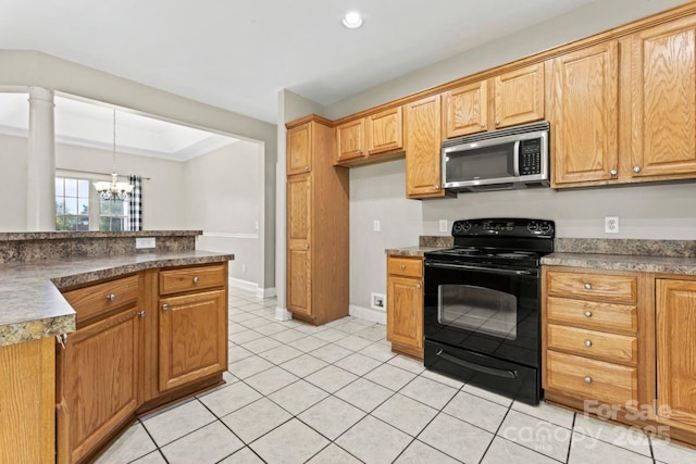 145 Mcbride Dr, Rockwell, NC 28138 - kitchen with stainless steel microwave, black electric range oven, a chandelier, light tile patterned floors, and dark countertops