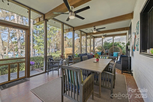 15921 Cramur Dr, Huntersville, NC 28078 - sunroom with a ceiling fan, beam ceiling, and outdoor dining space