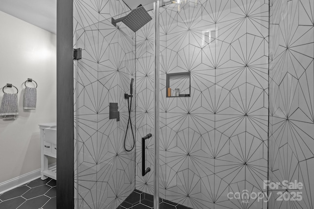 15921 Cramur Dr, Huntersville, NC 28078 - bathroom with baseboards, a tile shower, and tile patterned floors