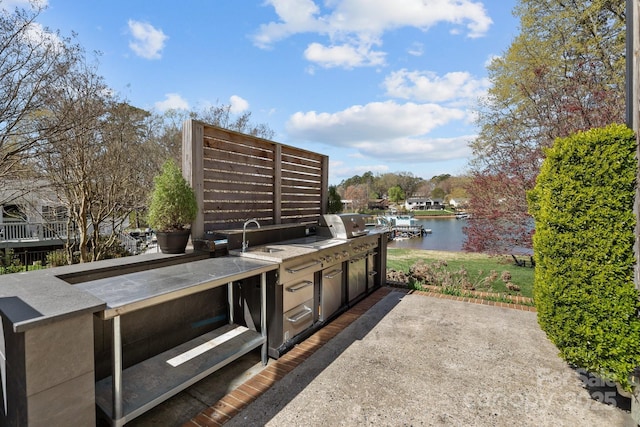 15921 Cramur Dr, Huntersville, NC 28078 - view of patio with a water view, a sink, grilling area, and area for grilling