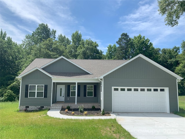 325 E St, Heath Springs, SC 29058 - single story home featuring a shingled roof, a garage, driveway, covered porch, and a front lawn