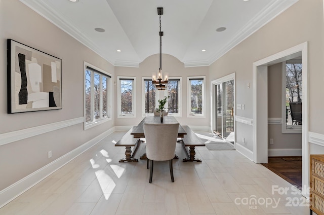 dining space featuring an inviting chandelier, baseboards, lofted ceiling, and recessed lighting