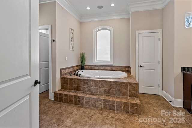 bathroom featuring tile patterned floors, ornamental molding, a garden tub, and recessed lighting