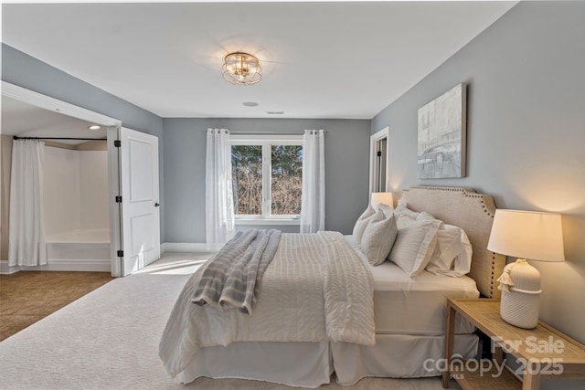 bedroom with carpet and baseboards
