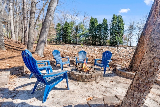 view of patio featuring an outdoor fire pit