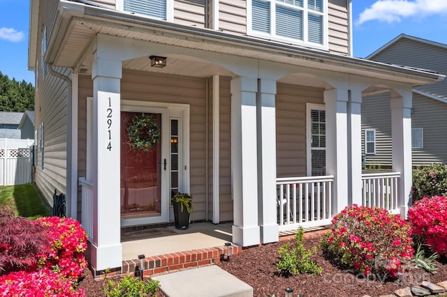entrance to property with covered porch
