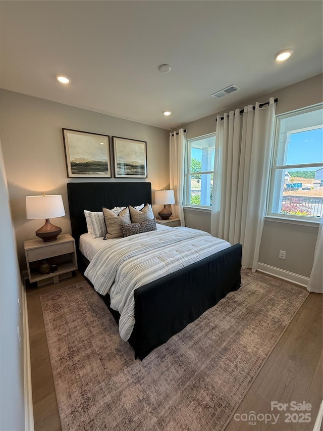 317 Maidstone Dr Unit 57, Monroe, NC 28110 - bedroom featuring wood finished floors, recessed lighting, and baseboards