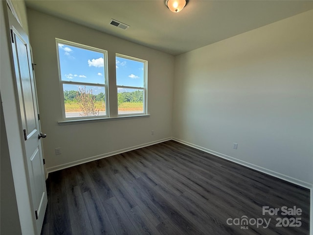317 Maidstone Dr Unit 57, Monroe, NC 28110 - empty room featuring dark wood-type flooring and baseboards