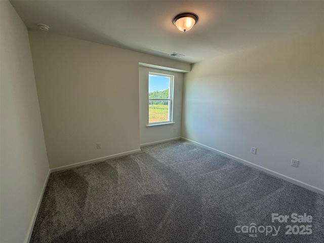 317 Maidstone Dr Unit 57, Monroe, NC 28110 - spare room with carpet floors and a smoke detector