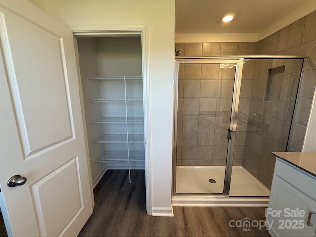 317 Maidstone Dr Unit 57, Monroe, NC 28110 - full bath with wood finished floors, a shower stall, and vanity