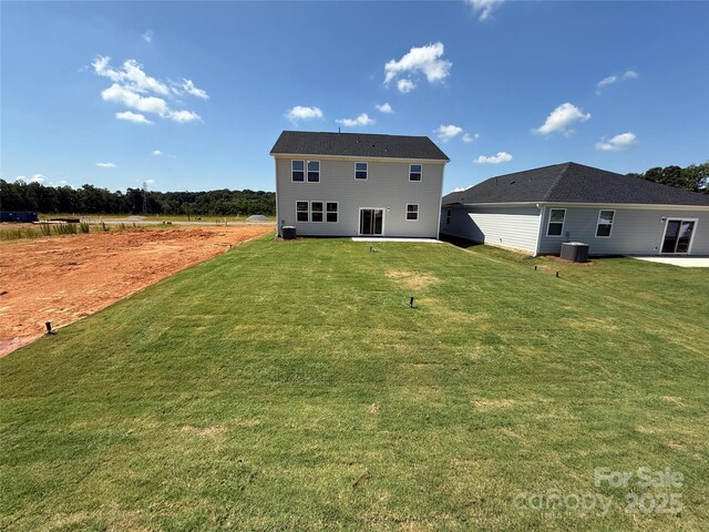 317 Maidstone Dr Unit 57, Monroe, NC 28110 - back of house with a lawn