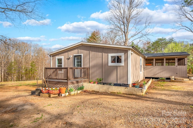 view of home's exterior featuring a deck