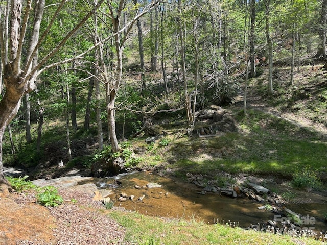 view of landscape with a view of trees