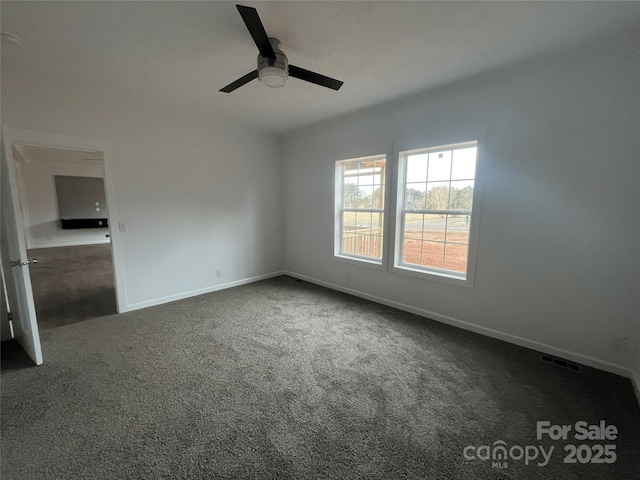 2070 Travis Rd, Conover, NC 28613 - carpeted empty room with ceiling fan and baseboards