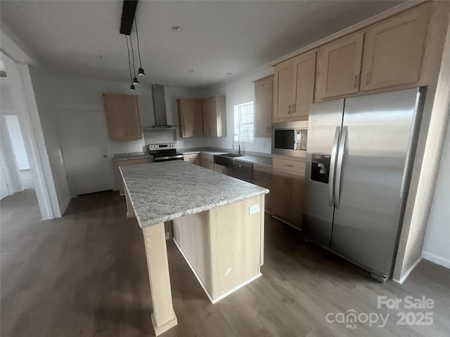 2070 Travis Rd, Conover, NC 28613 - kitchen featuring appliances with stainless steel finishes, wall chimney exhaust hood, a sink, a center island, and wood finished floors