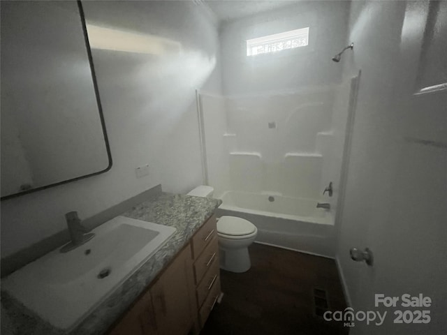 2070 Travis Rd, Conover, NC 28613 - bathroom featuring vanity, toilet, and tub / shower combination