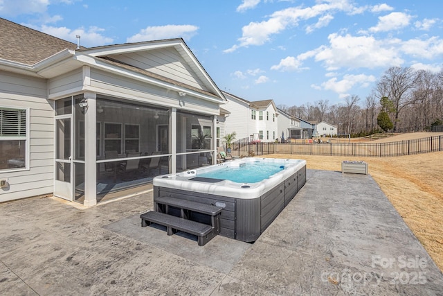 1512 Brooksland Pl, Waxhaw, NC 28173 - back of house with a hot tub, a sunroom, a fenced backyard, a patio, and roof with shingles