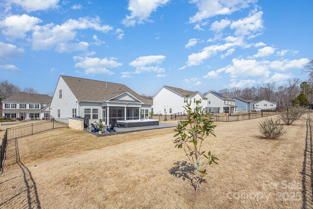 1512 Brooksland Pl, Waxhaw, NC 28173 - back of property featuring a sunroom and a residential view