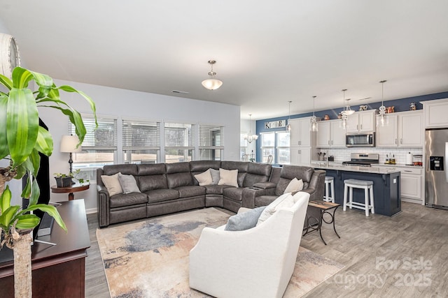 1512 Brooksland Pl, Waxhaw, NC 28173 - living room featuring light wood-style floors